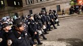 NYPD officers in full riot gear descend on Columbia University campus to clear protesters