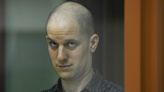 A U.S. journalist goes on trial in Russia on espionage charges that he and his employer deny