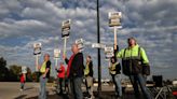 Workers at Louisville's Ford truck plant walk the picket line, joining UAW strike