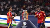 Soccer: Sublime Spain strike late to win record fourth Euro crown