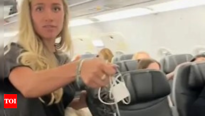 Jetblue Viral Video: Woman steals man's Apple charger on JetBlue flight, says she was going to give it back | World News - Times of India