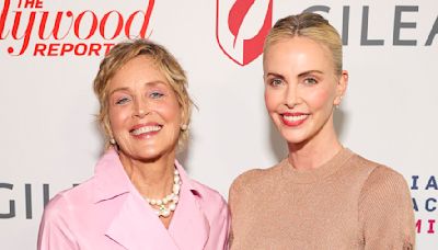 Sharon Stone is pretty in pink with Charlize Theron at LA event