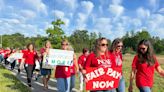 ‘We mean business!’ Wake teachers and bus drivers rally for higher pay raises.