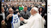 Pope gets his own UK basketball jersey, signs bottle of rare Kentucky bourbon