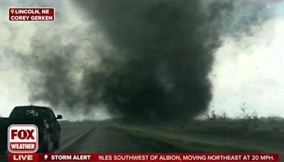 Watch: Tornado crosses Iowa interstate on live TV