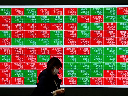 Stocks mixed, yen in focus after flirting with key level