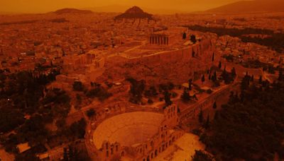 Eerie, orange skies loom over Athens as dust storm engulfs southern Greece