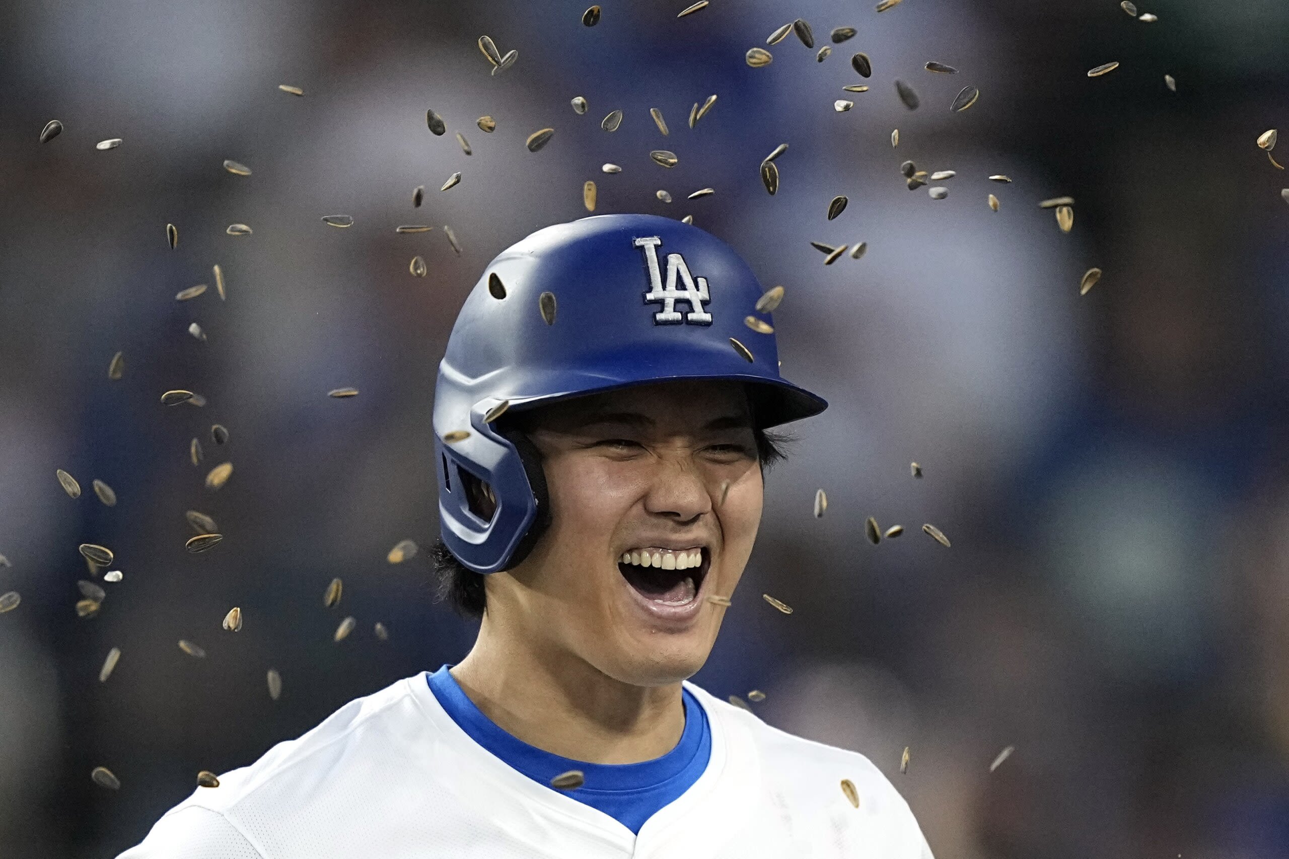 Ohtani hits 2-run homer and scores go-ahead run on his special day in LA as Dodgers beat Reds 7-3 - WTOP News