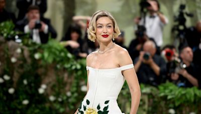 Gigi Hadid Goes Retro in a Floral White Tiered Dress at the 2024 Met Gala