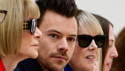 Harry Styles debuts new hair - and there's an unexpected party in the back