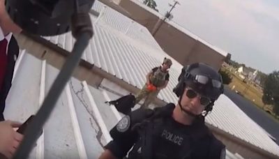 Bodycam footage shows moments after man who tried to assassinate Donald Trump was shot dead