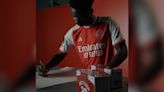 Watch Arsenal soccer fans on a London treasure hunt for posters signed by Bukayo Saka