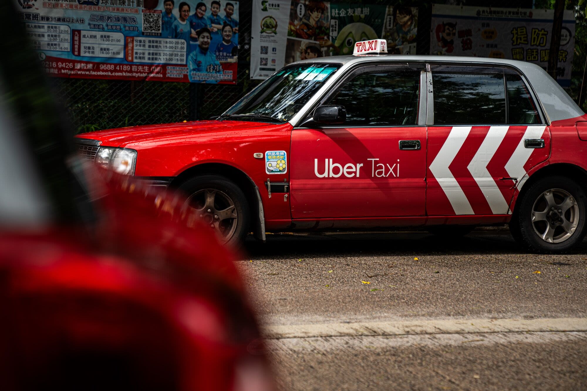 Hong Kong Unveils Plan to Regulate Uber Decade After Launch