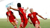 Olympics-Soccer-Canada edge New Zealand 2-1 amid Olympic spying scandal