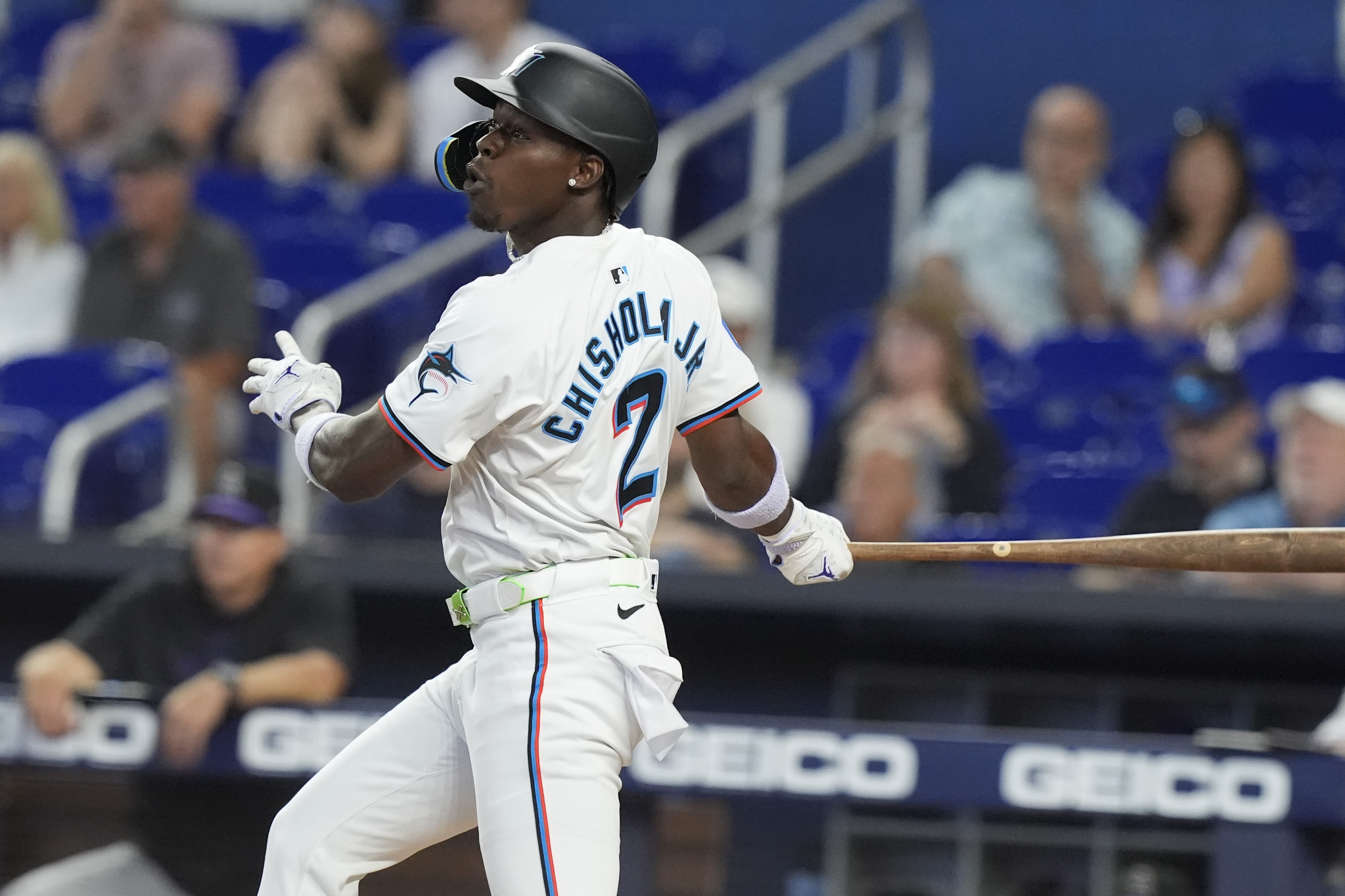 Marlins slip past Rockies 5-4 in 10 innings to cap three-game series sweep