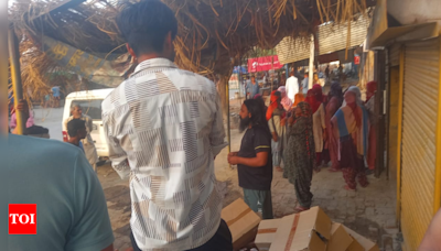 Women remove liquor vend located nearby a government school in Haryana’s Jind district | Jind News - Times of India