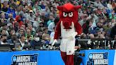 Which Arkansas basketball player was named preseason All-American?