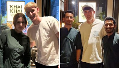 Two footballers surprise staff by dropping in at top Indian restaurant