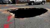 Authorities: Reckless driver passes through work area, opens sinkhole with car in Richmond