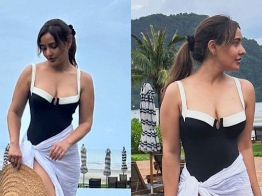 Sexy! Neha Sharma Shares Racy Photos In A Black Swimsuit From Her Vacation; See Viral Post - News18