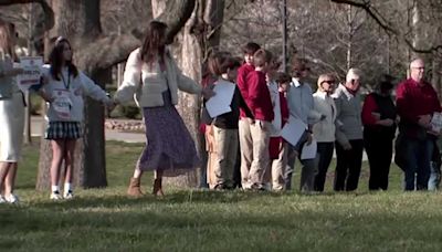 One year after Tennessee school shooting, thousands join hands to honor victims of gun violence