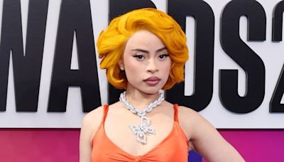 Ice Spice Is a Vixen in Vintage Versace Gown That Dips Below Her Belly Button at 2024 BET Awards