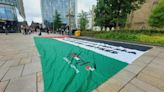 Giant Palestine flag unfurled in town centre