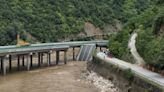 Bridge collapses in China, killing 15, after flash floods