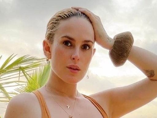 Rumer Willis looks in a bikini top with daughter Louetta, one