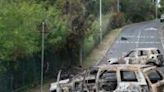 Burnt vehicles in the Magenta district of Noumea in France's Pacific territory of New Caledonia, on May 21, 2024