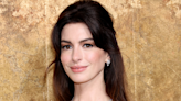 Anne Hathaway Turns Heads Everywhere in Shimmery Versace Gown