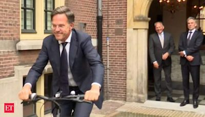 Watch Dutch PM Mark Rutt leaves PMO on bicycle after serving for 14 years, handing over power to his successor Dick Schoff - The Economic Times