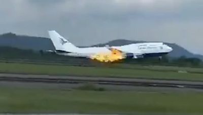 Moment flames shoot from the back of a Boeing carrying 468 passengers