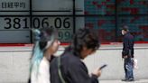 Stock market today: Asian markets wobble after Fed sticks with current interest rates