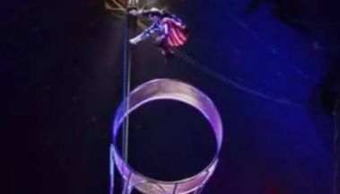 Stuntman falls from spinning 'wheel of death' in front of live audience