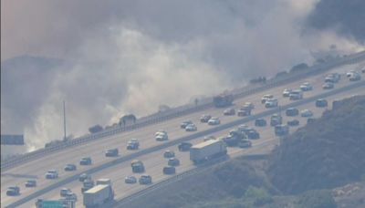 Crews battling brush fire burning near 210 Freeway in Tujunga