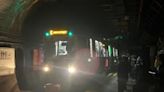 ‘We’re like miners’: Commuters left stranded in dark MBTA stations after power problem halts trains