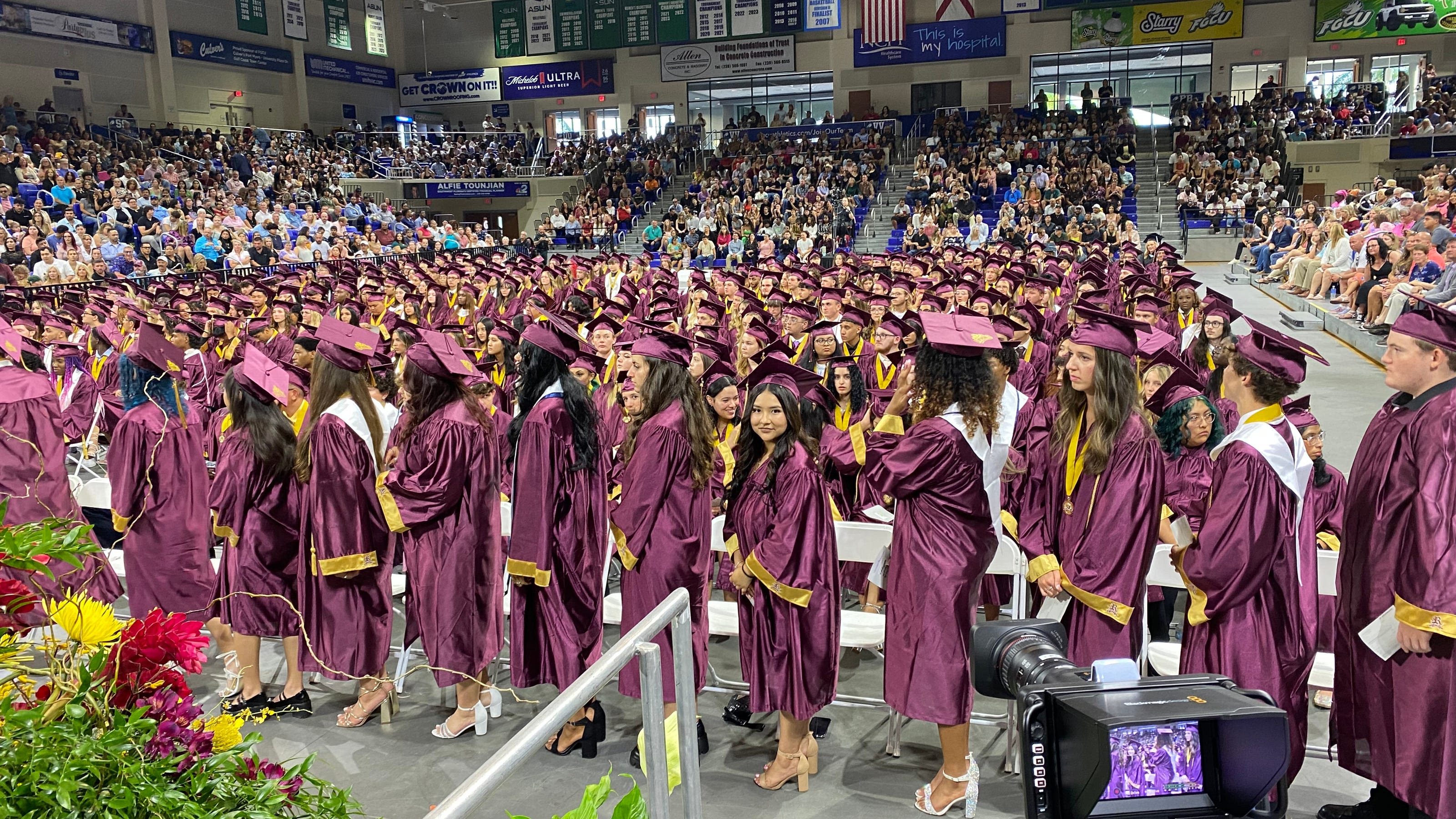 Graduation caps tossed high in the air. Riverdale High School's Class of 2024 celebrates