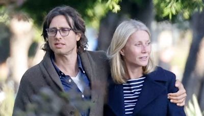 Gwyneth Paltrow and husband Brad Falchuk put on an affectionate display as they wrap their arms around each other after dinner date in LA