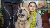 Parker the golden retriever helps Ukrainian girls deal with trauma