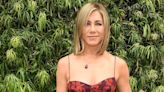 Jennifer Aniston Is Radiant in a Red Floral Gown and Crimson Accessories