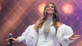 Delta Goodrem wows in a tight fitting white jumpsuit