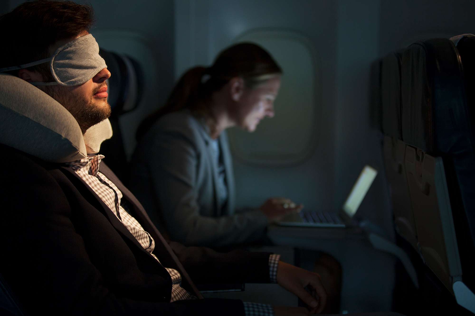 This Psychologist's Hack for Falling Asleep Quickly on Planes Is so Simple