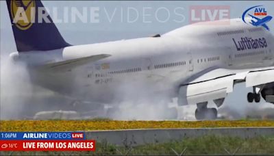 Boeing 747 carrying 345 people bounces on LAX runway during hard landing, video shows