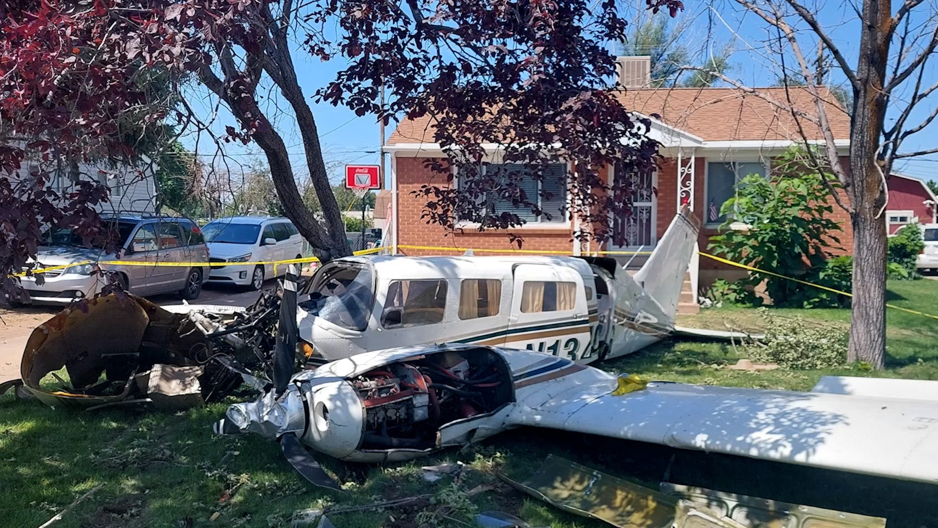 Video shows small plane crashing into front yard of Utah home with family inside