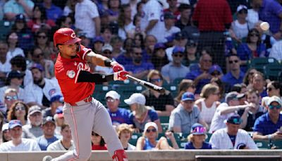 Santiago Espinal hits 2-run homer, Reds hold on to beat Cubs 5-4