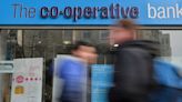 Britain's Co-op Bank plans 400 layoffs as merger talks continue