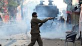 Violent clashes in Pakistan as police try to arrest former leader Imran Khan