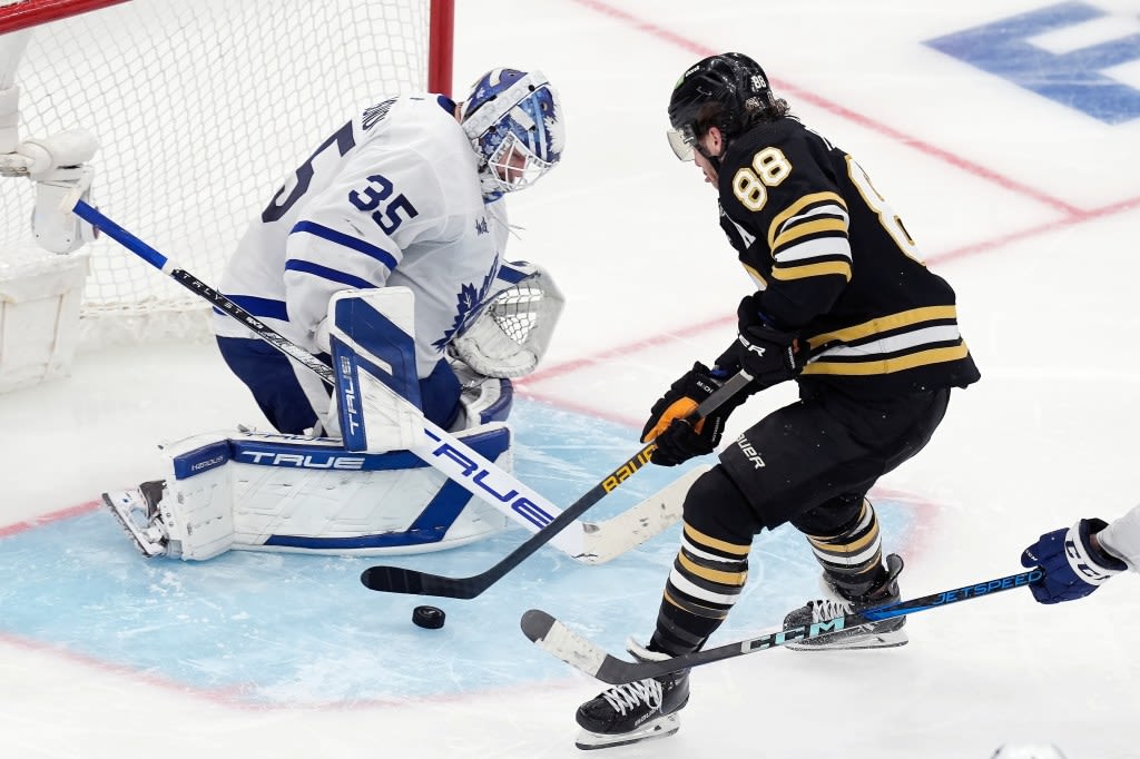 David Pastrnak scores in overtime to lift Bruins to Game 7 win over rival Maple Leafs