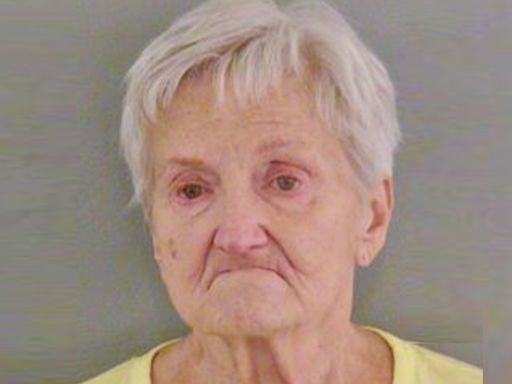 Retiree, 79, scowls in mugshot as she's banned for life from all Walmarts